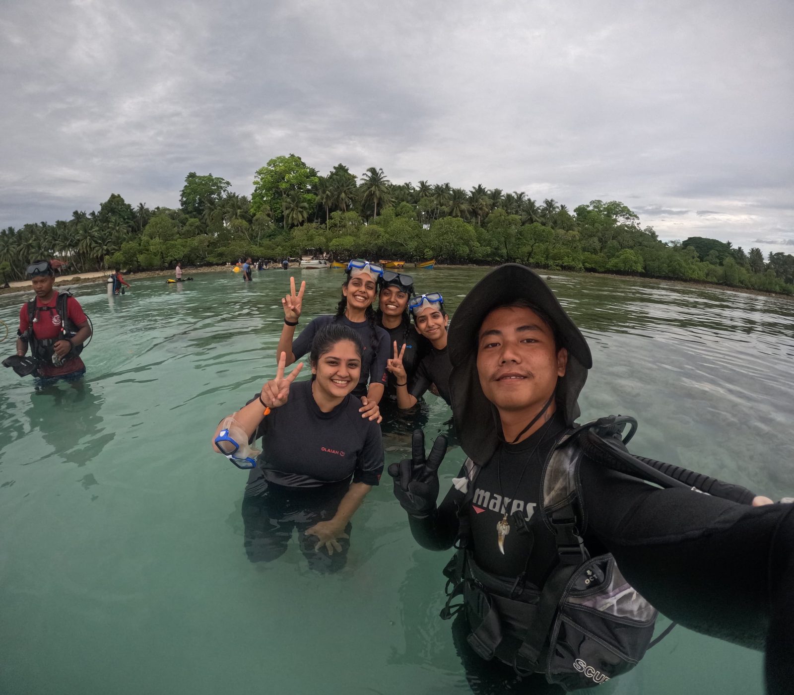 A Scuba India instructor guiding new divers in the shallows, Havelock